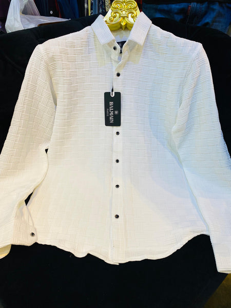 White shirt with a tag on a black background