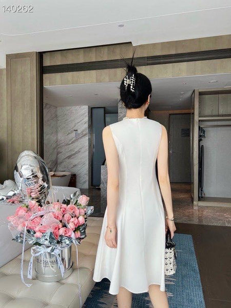 Elegant Sleeveless Black A-Line Dress with Asymmetrical Button Detailing