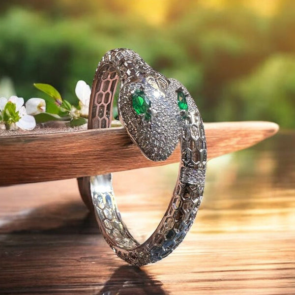 Elegant Emerald-Eyed Silver Snake Bracelet with Crystal Detailing