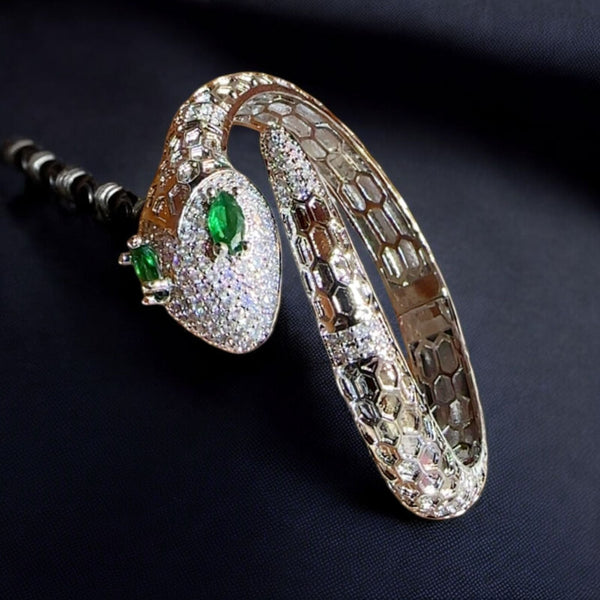 Elegant Emerald-Eyed Silver Snake Bracelet with Crystal Detailing