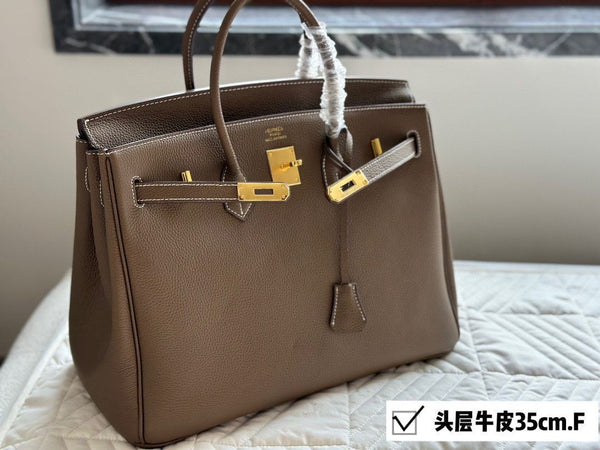 Elegant Taupe Leather Structured Handbag with Gold-Tone Hardware