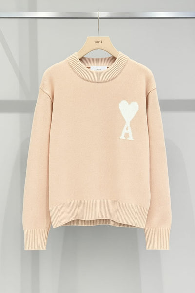 Luxury Crewneck Sweater with Heart Logo  Bold Contemporary Style