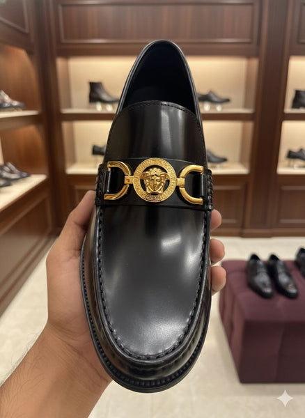 Luxury Black Leather Shoes with Gold Emblem