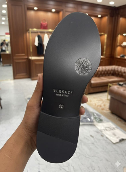 Luxury Black Leather Shoes with Gold Emblem