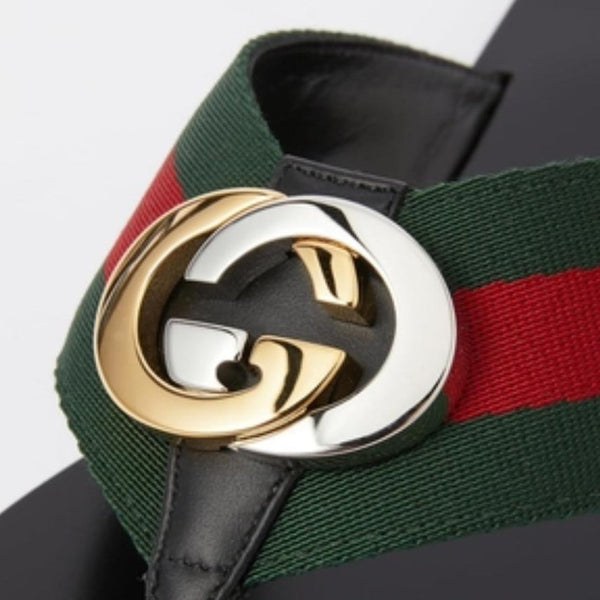 Stylish Black Flat Sandals with Signature Stripe Strap & Gold Logo Detail