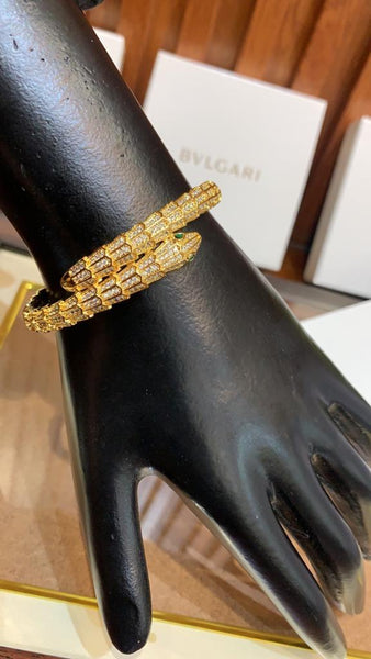 Premium Gold Bracelet  Diamonds and Two Emerald Eyes