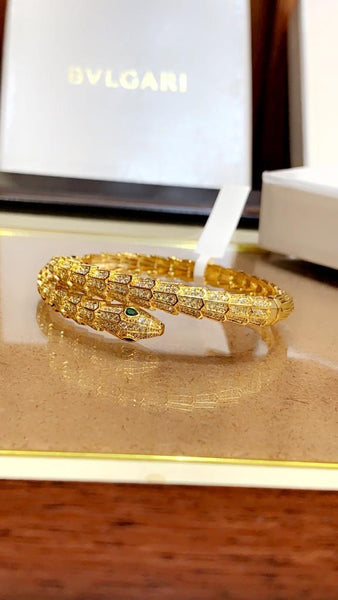 Premium Gold Bracelet  Diamonds and Two Emerald Eyes