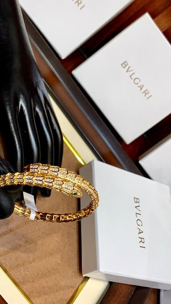 Premium Gold Bracelet  Diamonds and Two Emerald Eyes