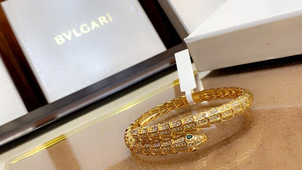 Premium Gold Bracelet  Diamonds and Two Emerald Eyes