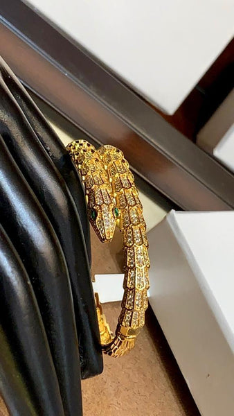 Premium Gold Bracelet  Diamonds and Two Emerald Eyes