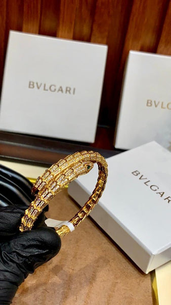 Premium Gold Bracelet  Diamonds and Two Emerald Eyes